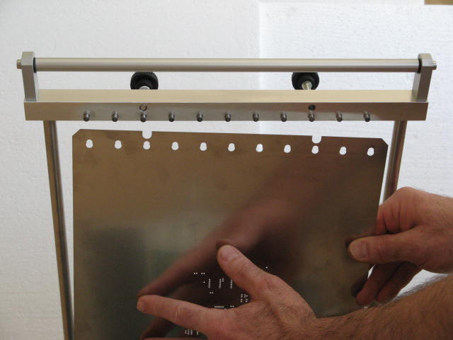 Mounting of the stencil with perforation